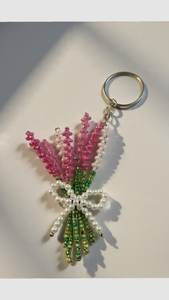 Porte-clés brodé à la main avec des motifs floraux élégants, des perles colorées et un travail artisanal détaillé - Product Image 4