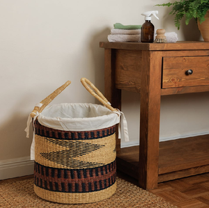 Tall <b>rectangular</b> woven <b>basket</b> laundry <b>basket</b> with an attached hinged lid and a gold-toned metal stand, available at wholesale. - Product Image 3