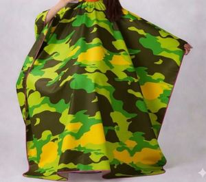 Bata de Barbero Impermeable Color Camuflaje Amarillo y Negro - Product Image 1