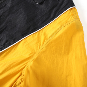 Veste coupe-vent imperméable Alpha noire, jaune et blanche, entièrement zippée, légère, en polyester, avec poches cachées et fermeture éclair - Product Image 2