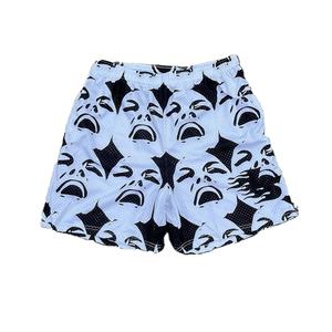 กางเกงขาสั้นสีขาวสำหรับเล่นกีฬาระบายอากาศได้ดีสำหรับฤดูร้อนกางเกงขาสั้นพิมพ์ลายกราฟิก - Product Image 1