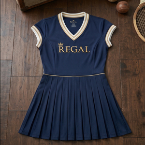 ชุดเทนนิสผู้หญิงสีน้ำเงินกรมท่า คอวี แบรนด์ Regal พร้อมลายปักสีทองและกระโปรงจีบ แขนสั้น - Product Image 1