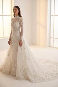 ชุดแต่งงานลูกไม้หรูหราประดับด้วยลายฉลุ แขนยาว พร้อมชายกระโปรงยาว ผู้ผลิตแบบ OEM - Product Image 3