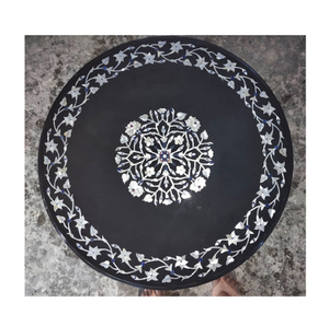 Tablero redondo de mármol negro con un delicado borde floral de nácar y un medallón central en forma de roseta, al por mayor. - Product Image 1