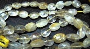Cuentas de cuarzo rutilado dorado natural, facetadas ovaladas tipo briolette, de 10 a 12 mm, se venden por hebra de 13 pulgadas. - Product Image 6