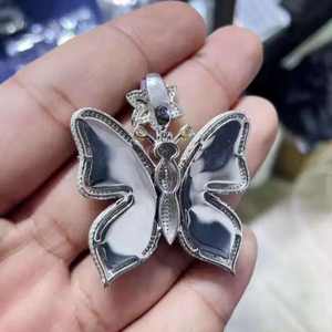 Pendentif papillon serti de pierres arc-en-ciel et d'accentuations en forme d'étoile florale, bijoux pour femmes, pendentif hip-hop en diamant - Product Image 3