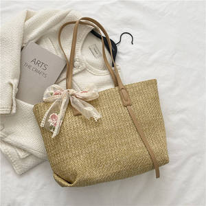 Capture the spirit of modern city life with this stylish Natural yarn bag featuring a structured <b>body</b> and an embroidered <b>bow</b> - Product Image 4