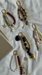 Porte-clés décoratif artisanal haut de gamme avec des perles et des broderies complexes pour les amateurs de mode - Product Image 3