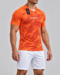 เสื้อฟุตบอลแขนสั้นสีส้มสำหรับผู้ชาย Claw Intl ระบายอากาศได้ดี ทรงพอดีตัว คอกลม มีโลโก้ด้านหลัง - Product Image 2