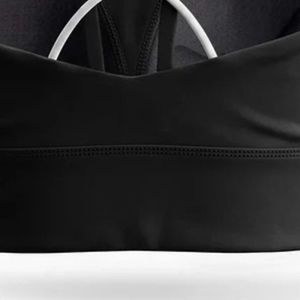 Débardeur de sport noir pour femme, coupe ajustée, col rond, sans manches, extensible, avec bretelles croisées, pour l'entraînement et le fitness - Product Image 5