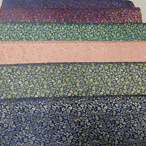 Tela brocada con motivos pequeños - Product Image 1