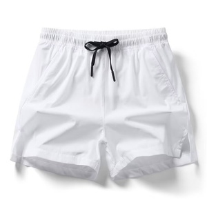Shorts décontractés polyvalents pour hommes, 100 % polyester, tissu peigné respirant, coupe ample et confortable, couleur unie - Product Image 1