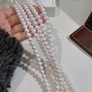 สร้อยคอมุกน้ำจืดขนาด 8-9 มม. ที่ละเอียดอ่อน สีขาวสว่าง พร้อมแสงอุ่นที่แข็งแกร่ง ใกล้เคียงกับทรงกลม ปราศจากแกนกลางเล็กน้อย - Product Image 1