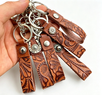 Porte-clés en cuir de cowboy personnalisé, créatif, faible MOQ, qualité assurée, exquis, durable, avec bracelet de poignet