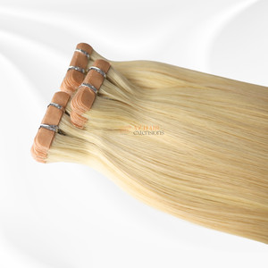 Extensiones de lujo en cinta Cabello humano se derrite en el cuero cabelludo Enredado libre 100% Cabello vietnamita crudo OEM Etiqueta privada lista - Product Image 1