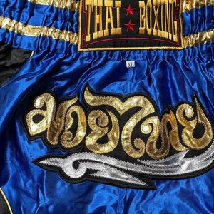 กางเกงมวยไทย MMA ราคาโรงงาน สั่งทำได้ โลโก้แบบเรียบ 100% โพลีเอสเตอร์ แห้งเร็ว ระบายอากาศ ป้องกันรังสียูวี เป็นมิตรกับสิ่งแวดล้อม สำหรับทุกเพศ - Product Image 2