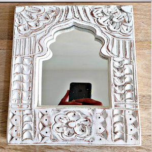 This rustic, distressed white <b>small</b> wall <b>mirror</b> features a charming, carved archway shape available at wholesale prices. - Product Image 1
