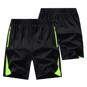 Shorts de sport noirs pour hommes à séchage rapide avec bande latérale vert néon, taille élastique, longueur Bermuda - Product Image 1