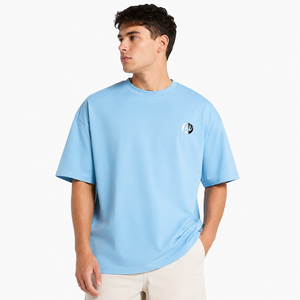 T-shirt homme surdimensionné à coupe décontractée, matière respirante, manches courtes et col rond classique, conçu pour un look streetwear décontracté. - Product Image 1