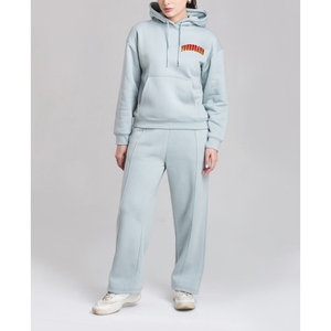 Fabricants de vêtements OEM sur mesure de haute qualité en tissu French Terry pour femmes : Ensemble survêtement avec sweat à capuche court zippé à imprimé en relief et pantalon évasé, États-Unis - Product Image 1