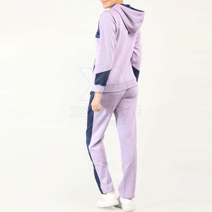 Chándal de mujer de tela elástica de alto rendimiento para entrenamiento físico, correr y uso diario con diseño inteligente. - Product Image 4