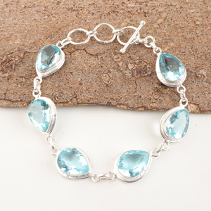 Pulsera de Plata de Ley 925 con Topacio Azul Cielo, Chapada en Latón, Hecha a Mano, Diseño Tenis, Gema Facetada en Forma de Pera - Product Image 1