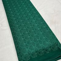 Großhandel Blumenmuster Schiffli-Bordüre Stickerei Polyester Chiffon Stoff Atmungsaktiv Umweltfreundlich Anpassbare Farbe Designer-Kleider