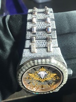 Montre de luxe pour homme à quartz analogique, entièrement sertie de diamants, bracelet en acier inoxydable, boîtier rond de 40 mm, fermoir déployant