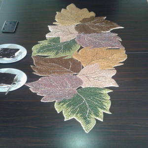 Elegant autumn maple leaf shaped handmade beaded <b>table</b> <b>runner</b> featuring rich colorful fall tones, available at wholesale prices. - Product Image 1