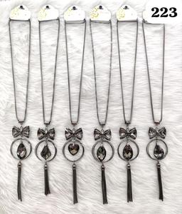 Collier long de luxe PingBling en métal canon de fusil avec nœud en cristal, double anneau, pendentif goutte facetté fumé, chaîne à pampilles et motif floral pour femme - Product Image 1