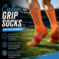 Chaussettes de football personnalisées à forte valeur ajoutée Chaussettes à prise en main d'usine Chaussettes antidérapantes