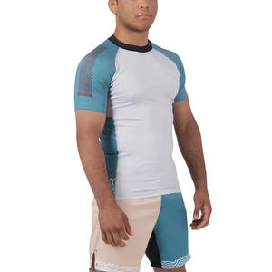 Rashguard Unisexe Personnalisé MMA BJJ Manches Courtes Raglan 100% Polyester UPF50 Respirant Séchage Rapide Fabricant OEM - Product Image 2