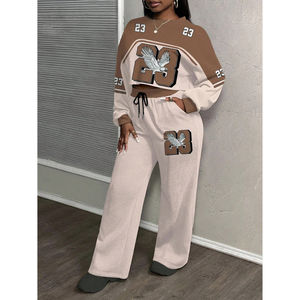 Conjunto de dos piezas de chándal de satén para mujer, estilo urbano, de invierno, con sudadera corta con capucha y cremallera, y pantalón jogger ajustado. - Product Image 1