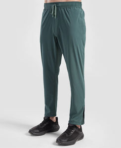 Pantalones Deportivos Unisex al por Mayor para Otoño, Sólidos, Transpirables, con Cintura Elástica y Cordón Ajustable, para Gimnasio y Correr, con Cremallera en el Tobillo - Product Image 1