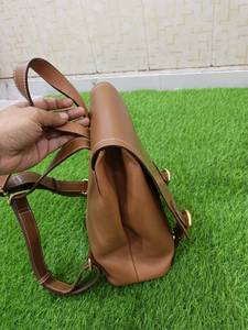 2026 Hot selling Classic Genuine <b>Leather</b> <b>Backpack</b> with Flap Closure and Buckle Detail Unisex Daily Use Shoulder Customized Bags - Product Image 3