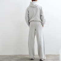 Survêtement à capuche uni et ample Performance, coupe confortable, tissu extensible 100% coton, léger et écologique pour le sport