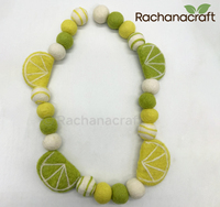 Handgemaakte ecovriendelijke wollen vilt citrus fruit guirlande - citroen limoen plakjes pom pom streamer voor verjaardag Halloween zomer kinderkamer