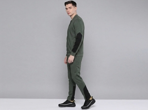 ชุดวอร์มผู้ชายสีเขียวแบบ Color Blocking พร้อมเชือกผูก แจ็คเก็ตคอตั้ง กางเกงขายาว ระบายอากาศได้ดี เป็นมิตรกับสิ่งแวดล้อม ผลิตจากโพลีเอสเตอร์/คอตตอน สไตล์สปอร์ต 2 ชิ้น - Product Image 6