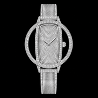 Montre de luxe à diamants glacés, boîtier ovale en acier inoxydable argenté, bracelet maille milanaise, mouvement quartz ETA, montre-bracelet habillée pour hommes et femmes