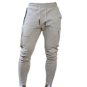 Vente en gros d'usine de pantalons de course fitness pour hommes avec logo personnalisé pantalons décontractés avec fermeture éclair et poches multiples pantalons pantalons de survêtement pour hommes - Product Image 1