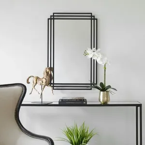 Miroir mural en métal poli brillant élégant pour une décoration intérieure sophistiquée, idéal pour les salons et chambres contemporains. - Product Image 3