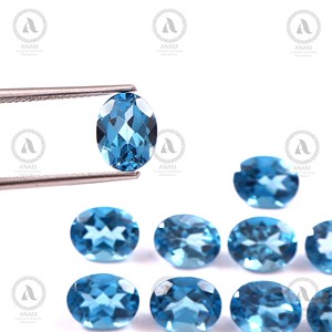 ANAM EMPORIUM - Piedra Suelta de Topacio Azul, Forma Ovalada, Facetada, Grado AAA, 7x9 mm, 3 Quilates, para Joyería - Product Image 1