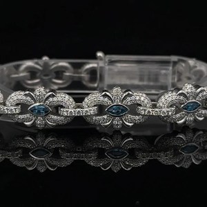 Premium Floral Pattern <b>Bracelet</b> Featuring Blue Marquise Cut Stones And Sparkling Lab Grown Diamonds - Product Image 1