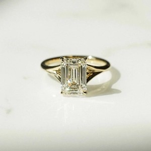 Elegant Emerald Cut Diamond Engagement <b>Ring</b> In Yellow Gold <b>Solitaire</b> Setting - Product Image 1