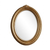 Hochwertiger ovaler Wandspiegel mit goldperlenbesetztem Rahmen, traditionelles dekoratives Holzdesign für den Innenbereich.
