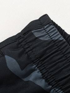 Shorts de plage pour hommes à imprimé camouflage, séchage rapide, taille à cordon de serrage, maillots de bain avec poches, tissu en polyester tissé - Product Image 2