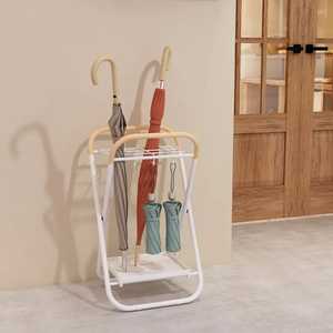 Moderno Soporte para Paraguas de Metal Negro con Diseño Abstracto de Espiral Recortada, Soporte Alto Hueco para Bastones y Almacenamiento de Varillas en la Entrada - Product Image 1