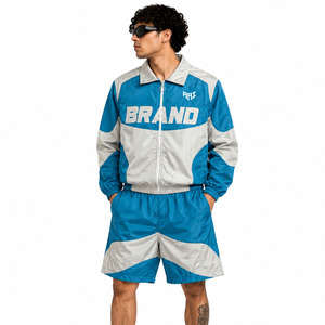 เสื้อแจ็คเก็ตและกางเกงขาสั้นวิ่งออกกำลังกายแบบมีแถบสะท้อนแสง 2 ชิ้น ตัดเย็บแบบแพทช์เวิร์ค ทำจากไนลอน กันลม น้ำหนักเบา เหมาะสำหรับฤดูร้อน พร้อมฮู้ด - Product Image 1