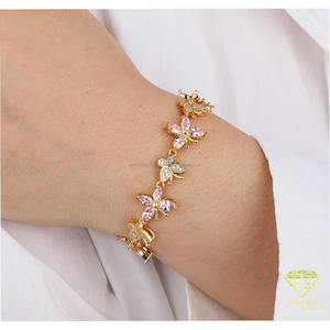Elegant Gold Tone Bracelet Featuring <b>Pink</b> <b>Petal</b> Details And Clear Sparkling Accents For Retailers And Resellers - Product Image 4