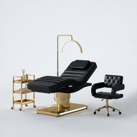 Table de massage électrique esthétique de luxe moderne noire et or pour salon de beauté, spa facial, extensions de cils et soins cosmétiques